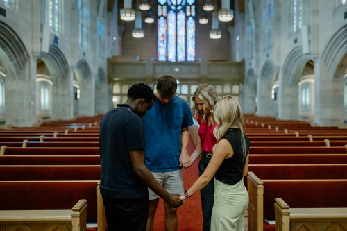 Students praying together in the chapel..